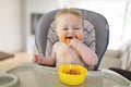 A Little baby eating her dinner and making a mess Royalty Free Stock Photo