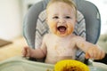 A Little baby eating her dinner and making a mess Royalty Free Stock Photo