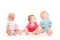 Little babies are playing over white background Royalty Free Stock Photo
