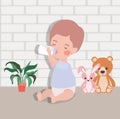 Little baby boy with bottle milk and stuffed toys Royalty Free Stock Photo