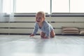 Little baby boy crawling on floor at home Royalty Free Stock Photo