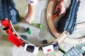 Little baby boy playing with colorful wooden train on the carpet Royalty Free Stock Photo