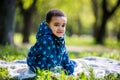 Little baby boy playing on the playground in the spring park Royalty Free Stock Photo