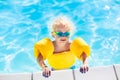 Little baby boy playing in swimming pool Royalty Free Stock Photo