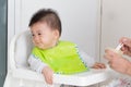 Little baby boy refuses to eat because eating full or not like food. Royalty Free Stock Photo