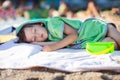 Little baby boy, sleeping on the beach in the afternoon Royalty Free Stock Photo