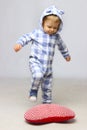 Little Baby Boy In Sleepwear Playing.
