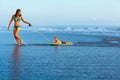 Young surfer boy with bodyboard has fun on sea beach Royalty Free Stock Photo