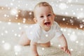Little baby in diaper crawling on floor at home Royalty Free Stock Photo