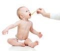 Little baby feeding with a spoon Royalty Free Stock Photo