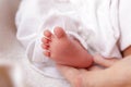 Little baby feet and mother hand Royalty Free Stock Photo