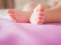 Little baby feet. Theres nothing quite so sweet as tiny little baby feet. Little baby boy on bed. Close up. Space for copy Royalty Free Stock Photo