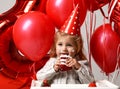 Little baby girl celebrate her second birthday with sweet cake o Royalty Free Stock Photo