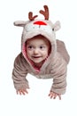A little baby girl dressed moose christmass dress.
