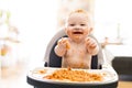 Little baby girl eating her spaghetti dinner and making a mess Royalty Free Stock Photo