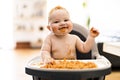 Little baby girl eating her spaghetti dinner and making a mess Royalty Free Stock Photo