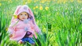 Little baby girl with flowers