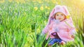 Little baby girl with flowers