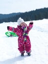 Little baby girl have fun on fresh snow Royalty Free Stock Photo
