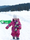 Little baby girl have fun on fresh snow Royalty Free Stock Photo