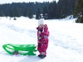 Little baby girl have fun on fresh snow Royalty Free Stock Photo