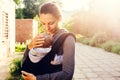 Little baby girl and her mother walking outside during sunset. M Royalty Free Stock Photo