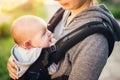 Little baby girl and her mother walking outside during sunset. M Royalty Free Stock Photo