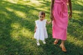 Little baby girl holding her mother`s hand Royalty Free Stock Photo