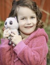 Little Baby Girl Holding Stuffed Toys Wearing Pink Royalty Free Stock Photo