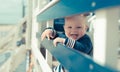 Little baby girl laughing and having fun on a beachhouse