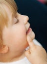 Little baby girl making face portrait Royalty Free Stock Photo