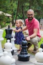 Playing giant chess