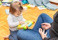 Baby. Girl. Joy. Reading. Book. Mother Royalty Free Stock Photo