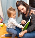 Baby Girl. Reading. Book. Joy. Mother Royalty Free Stock Photo