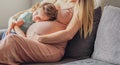 Little baby girl relaxing on mom's pregnant belly - Pregnant mother with a toddler - Family concept Royalty Free Stock Photo