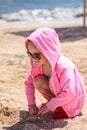 Little baby girl on the sand beach Royalty Free Stock Photo