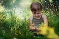 Little baby girl sitting in grass Royalty Free Stock Photo