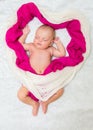 Little baby girl sweetly a sleep in pink scarves Royalty Free Stock Photo