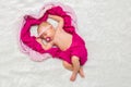 Little baby girl sweetly a sleep in pink scarves Royalty Free Stock Photo