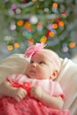 Little baby girl wearing pink crochetting dress