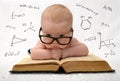 Little baby in glasses with eauations around Royalty Free Stock Photo