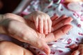 Little baby holding mother`s hand Royalty Free Stock Photo