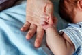 Little baby holding mother`s hand Royalty Free Stock Photo