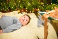 Little baby and new year. Children`s first Christmas. Beautiful little child celebrates Christmas. New Year holidays. A child wit