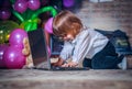 Little baby playing with laptop Royalty Free Stock Photo