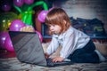 Little baby playing with laptop Royalty Free Stock Photo