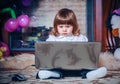 Little baby playing with laptop Royalty Free Stock Photo