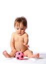 Little baby plays with small football ball Royalty Free Stock Photo