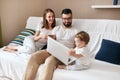 Little baby using laptop, learining to type messages Royalty Free Stock Photo