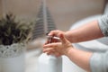 Little baby washing and trying to wash hands with soap dispenser and tap water Royalty Free Stock Photo